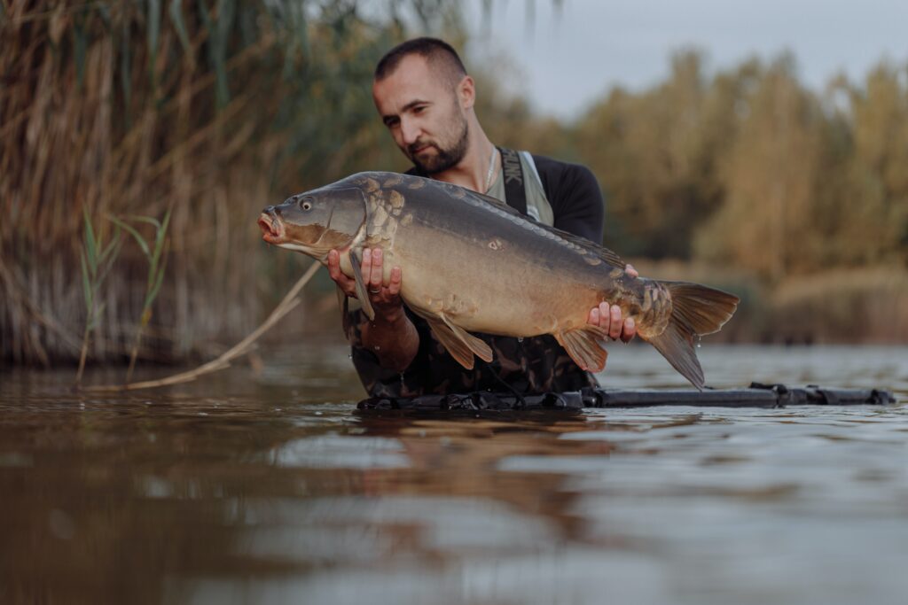 A picture of a man holding