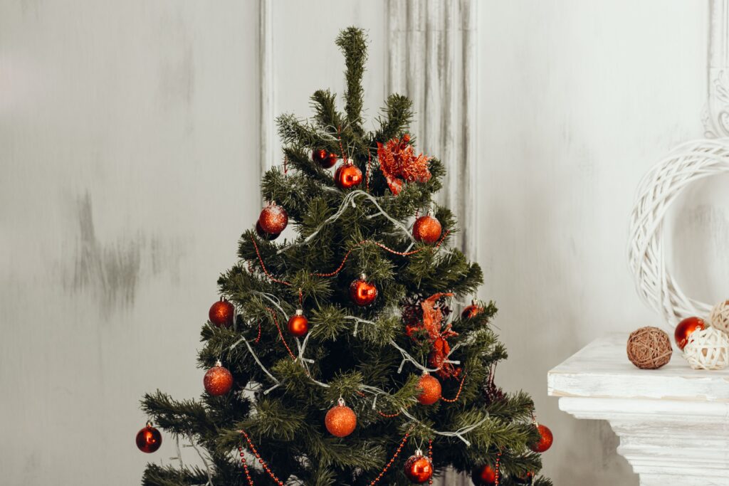 a Christmas tree with red baubles.