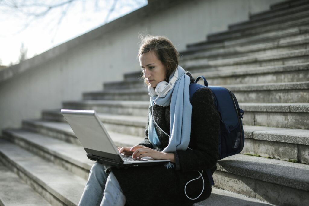 An image of a student on a laptop